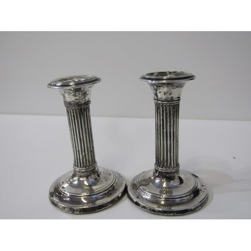 222 - 2 PAIRS OF SILVER CANDLESTICKS, a pair of Edwardian silver candlesticks on tapering support with rem... 