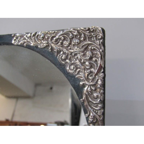 225 - EASEL DRESSING TABLE MIRROR, a circular easel mirror with silver mounts with foliate decoration in r... 