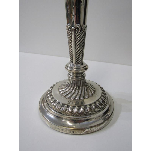 226 - GEORGIAN SILVER CANDLESTICKS, of circular tapering form with fluted circular base maker IR & Co., Lo... 