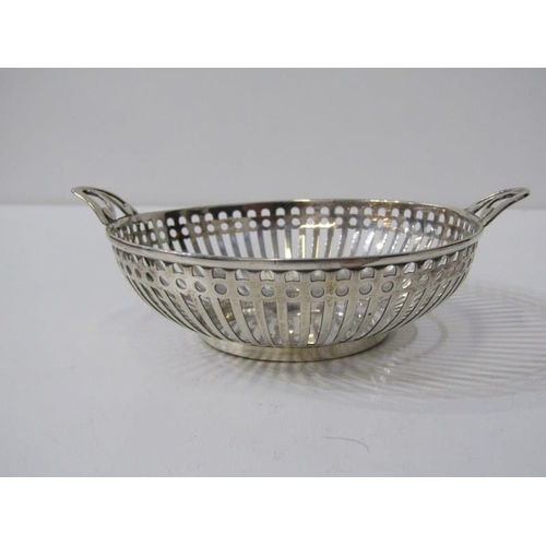 243 - PIERCED SILVER BONBON DISHES, circular silver bonbon dish with pieced handles and body, Birmingham 1... 