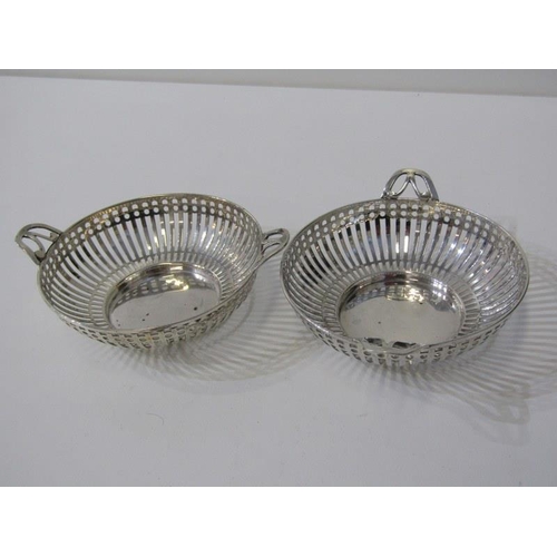 243 - PIERCED SILVER BONBON DISHES, circular silver bonbon dish with pieced handles and body, Birmingham 1... 