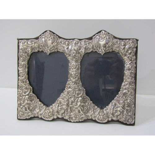 249 - ORNATE EMBOSSED SILVER DOUBLE HEART SHAPED PHOTO FRAME, on easel stand, 19cm height