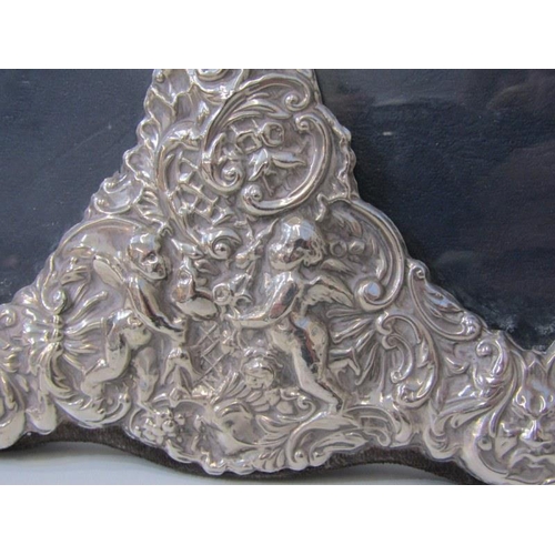 249 - ORNATE EMBOSSED SILVER DOUBLE HEART SHAPED PHOTO FRAME, on easel stand, 19cm height