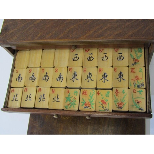 436 - MAH JONG, a travelling 5 drawer cabinet containing bamboo tiles, 21cm width