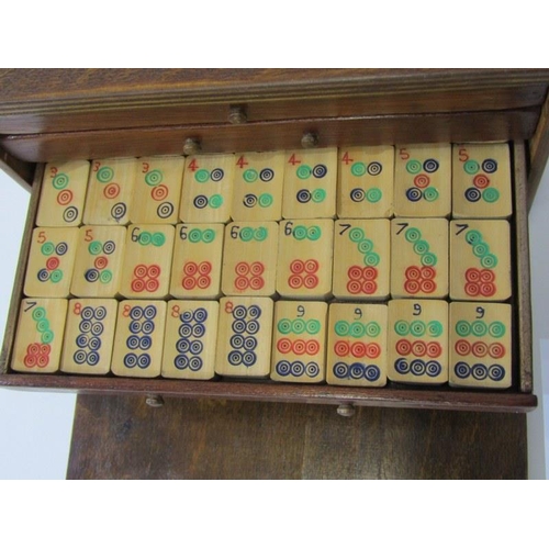 436 - MAH JONG, a travelling 5 drawer cabinet containing bamboo tiles, 21cm width