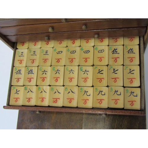 436 - MAH JONG, a travelling 5 drawer cabinet containing bamboo tiles, 21cm width