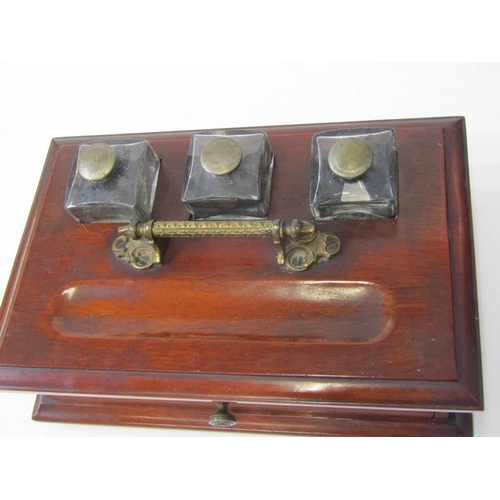 437 - EDWARDIAN STANDISH, mahogany drawer base standish with triple inkwell bottles, 30cm width