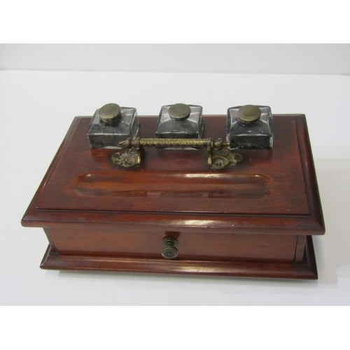 437 - EDWARDIAN STANDISH, mahogany drawer base standish with triple inkwell bottles, 30cm width