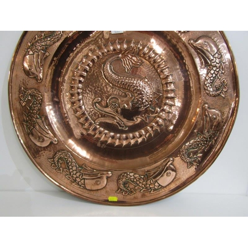 492 - NEWLYN COPPER, an impressive leaping fish design 59cm circular charger, unsigned