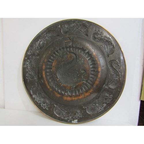 492 - NEWLYN COPPER, an impressive leaping fish design 59cm circular charger, unsigned