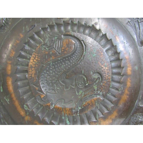 492 - NEWLYN COPPER, an impressive leaping fish design 59cm circular charger, unsigned