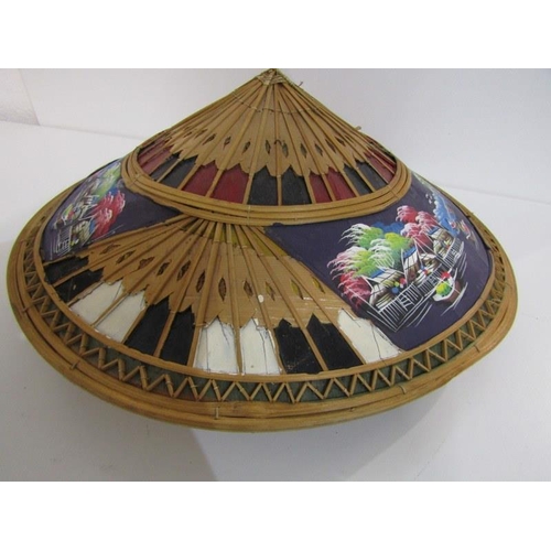 128 - ORIENTAL STRAW HAT, decorated a landscape, 38cm diameter