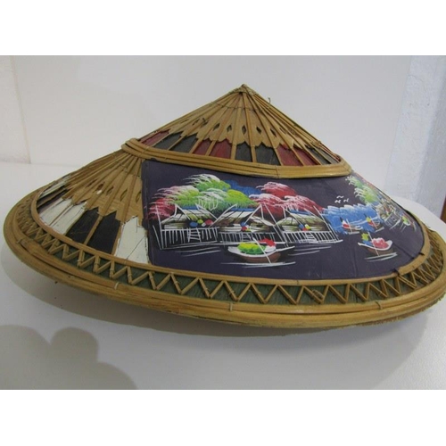 128 - ORIENTAL STRAW HAT, decorated a landscape, 38cm diameter