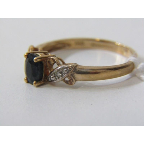 286 - SAPPHIRE AND DIAMOND RING, 9ct yellow gold ring set with an oval sapphire with diamond chip shoulder... 