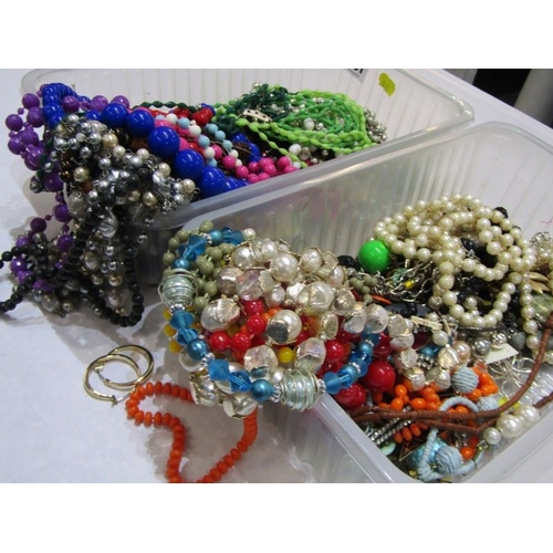 332 - BEADED NECKLACES, 2 tubs of colourful beaded necklaces and faux style pearls, also earrings and othe... 