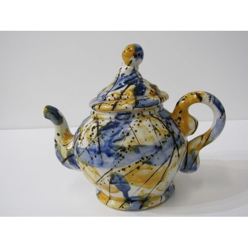 13 - ART POTTERY TEAPOT, Roger Michel teapot in blue, yellow and brown, also a Rory Louden milk jug of ba... 