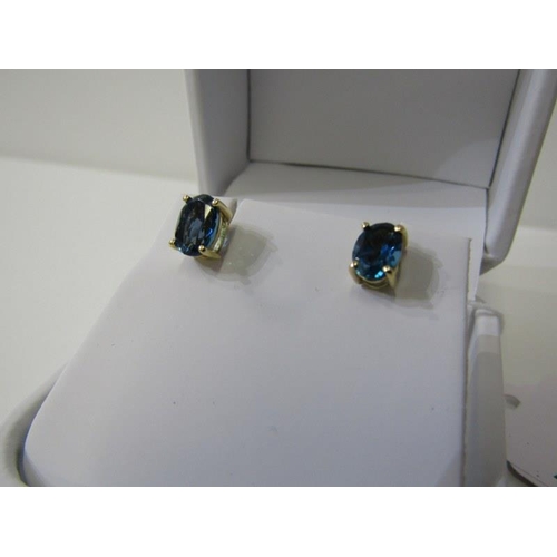 159 - TOPAZ EARRINGS, a pair of 9ct yellow gold earrings, set oval blue topaz, approx. 6.5mm length