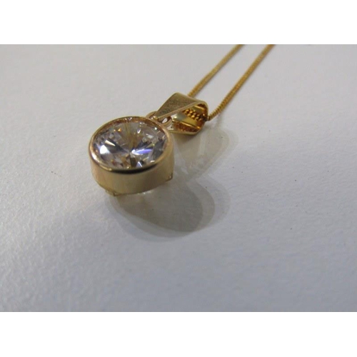 166 - 9CT GOLD PENDANT ON FINE LINK CHAIN, a circular CZ set in 9ct gold mount on fine link 16