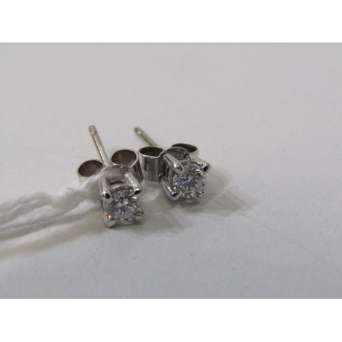 167 - DIAMOND STUD EARRINGS, a pair of 18ct white gold earrings, each earring set well matched round brill... 