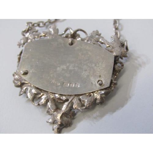 174 - SILVER DECANTER LABEL, with vine & grape decoration, London hallmark, 22grms