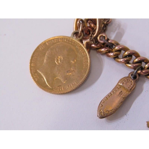 184 - GOLD CHARM BRACELET, 9ct gold curb link watch chain set 1910 half sovereign together with 9 further ... 