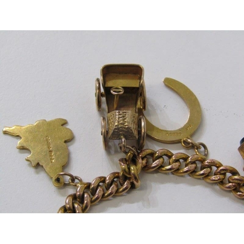 184 - GOLD CHARM BRACELET, 9ct gold curb link watch chain set 1910 half sovereign together with 9 further ... 