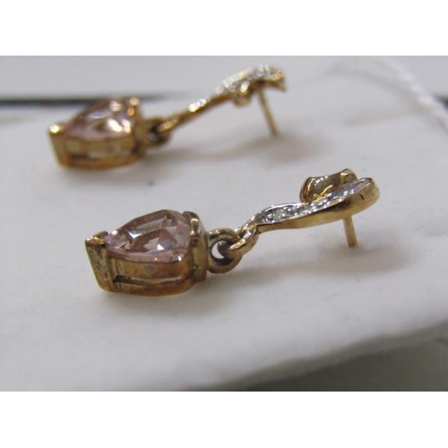 185 - TOPAZ DROP EARRINGS, pair of 9ct yellow gold drop earrings, set triangular cut pink topaz