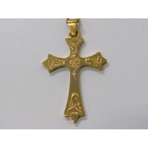 196 - GOLD CROSS ON FINELINK CHAIN, yellow gold gothic style cross with engraved decoration (tests as 18ct... 