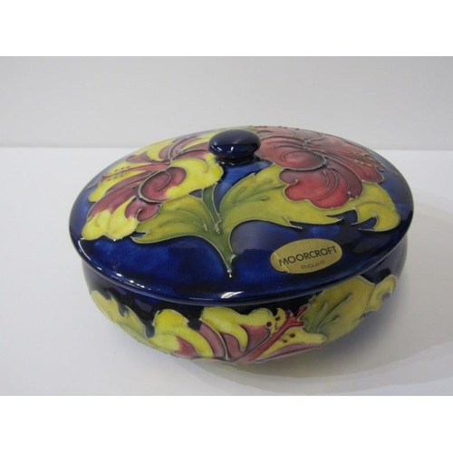 2 - MOORCROFT, Moorcroft shallow lidded dish, decorated hibiscus pattern on a blue ground, 70cm diameter