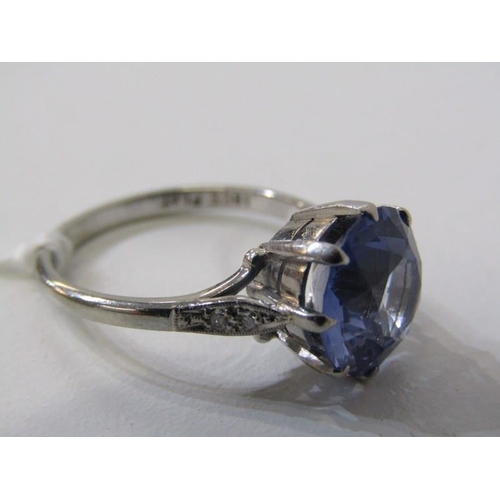 200 - PLATINUM RING, 18ct white gold and platinum mounted ring, set a round blue stone, tests as sapphire,... 