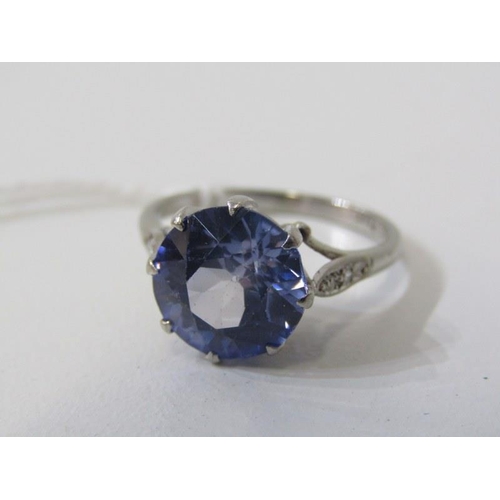 200 - PLATINUM RING, 18ct white gold and platinum mounted ring, set a round blue stone, tests as sapphire,... 