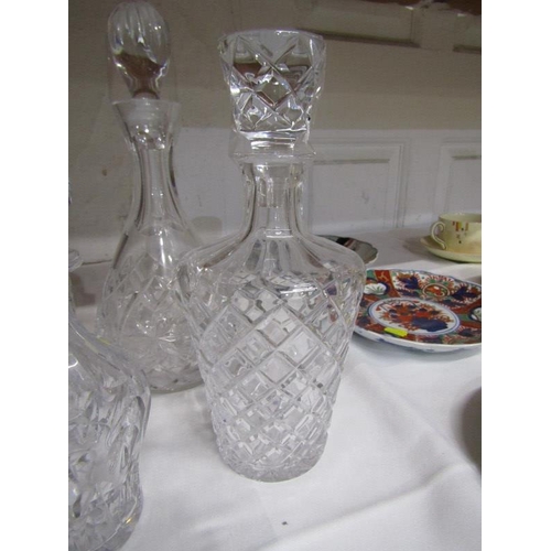 22 - DECANTERS, 4 assorted cut glass decanters