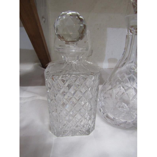 22 - DECANTERS, 4 assorted cut glass decanters