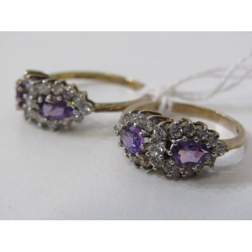 228 - SILVER GILT STONESET RINGS, pair of amethyst and clear stone set rings, on silver gilt mounts, size ... 