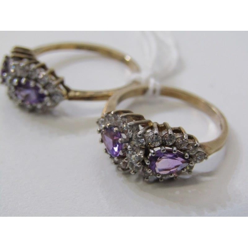 228 - SILVER GILT STONESET RINGS, pair of amethyst and clear stone set rings, on silver gilt mounts, size ... 