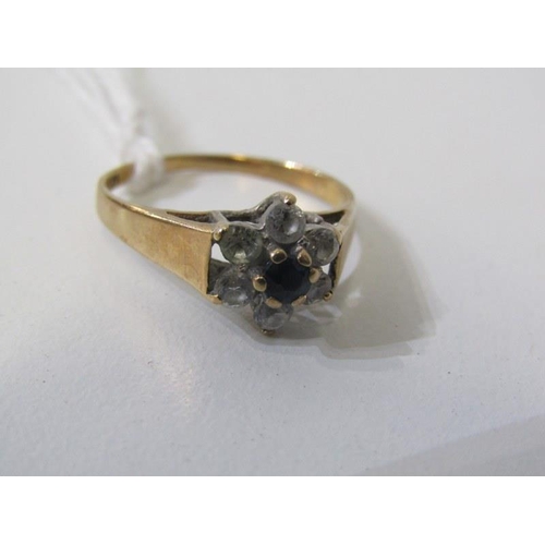 237 - SAPPHIRE CLUSTER RING, 9ct yellow gold set a central sapphire in a cluster of clear stones, size M/N