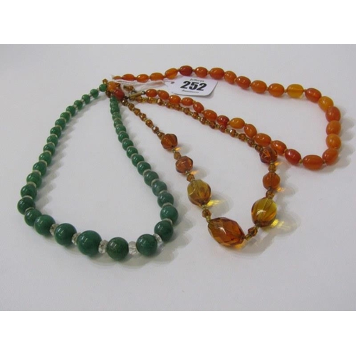 252 - COSTUME NECKLACES, butterscotch amber style beaded necklace, a green jade style necklace and 1 other... 