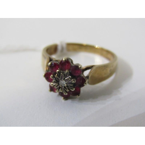 260 - RUBY & DIAMOND CLUSTER RING, 9ct yellow gold ring set a central diamond, surrounded by a cluster of ... 