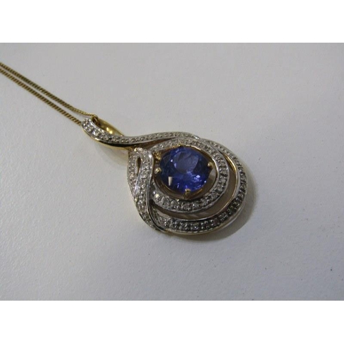 262 - TANZANITE & DIAMOND PENDANT, 9ct yellow gold pendant, set a large circular tanzanite, 8mm diameter, ... 