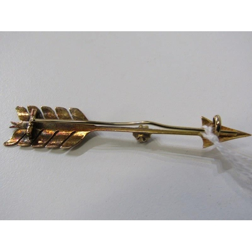 263 - ARROW BROOCH, yellow gold brooch in the form of an arrow, (tests as 14ct) set a diamond, 4 grams