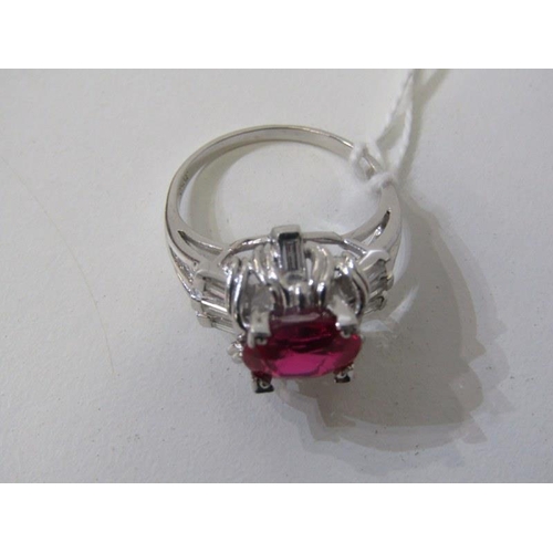 266 - DIAMOND & PLATINUM RING, oval lab grown ruby set in platinum with approx, 9mm spread with baguette c... 