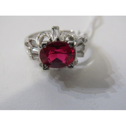 266 - DIAMOND & PLATINUM RING, oval lab grown ruby set in platinum with approx, 9mm spread with baguette c... 