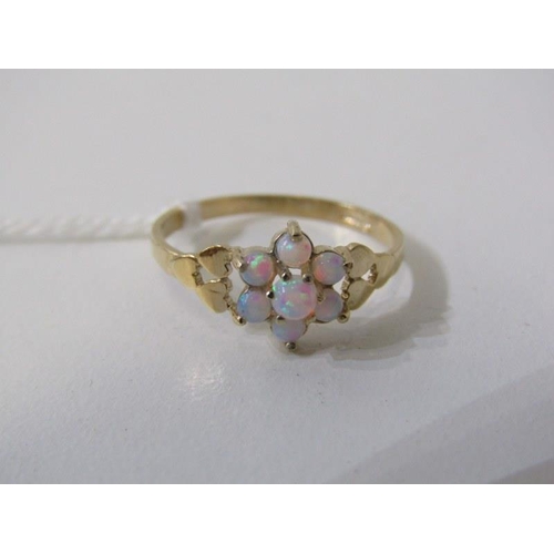 272 - OPAL CLUSTER RING, 9ct yellow gold ring set a cluster of 7 opals in a daisy style setting, size M/N