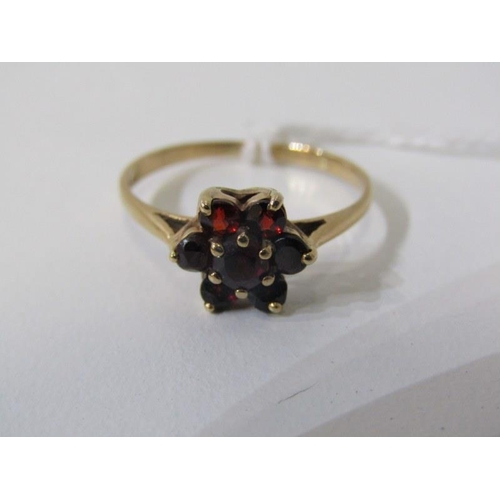 282 - GARNET CLUSTER RING, 9ct yellow gold ring, set a cluster of garnets, size N/O