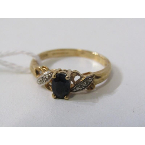 286 - SAPPHIRE AND DIAMOND RING, 9ct yellow gold ring set with an oval sapphire with diamond chip shoulder... 