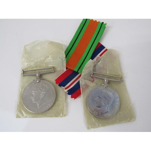 312 - WWII PAIR, WWII War & Defence medal in box of issue, also a George VI Efficiency medal, a tank regim... 