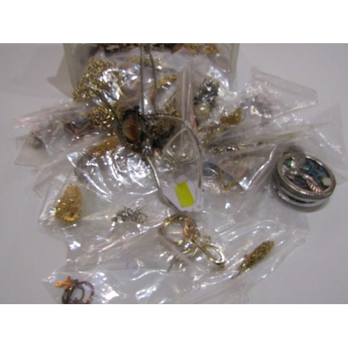 328 - COSTUME JEWELLERY, over 50 bags of assorted costume jewellery including stone set bracelets, necklac... 