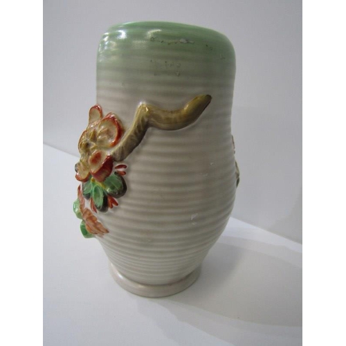 355 - CLARICE CLIFF, Clarice Cliff ribbed vase with floral decoration in relief, 16cms hight