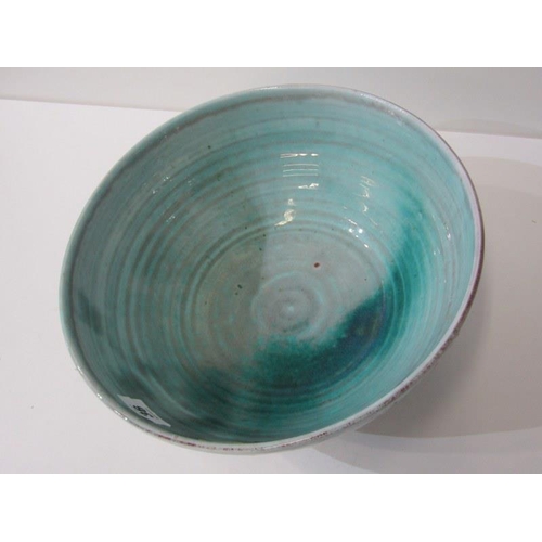 36 - ART POTTERY, large art pottery bowl on stemmed support with green glaze, 26cm