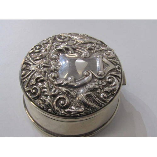 368 - SILVER RING BOX, circular base embossed erden scroll design